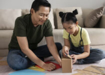 dad and daughter playing